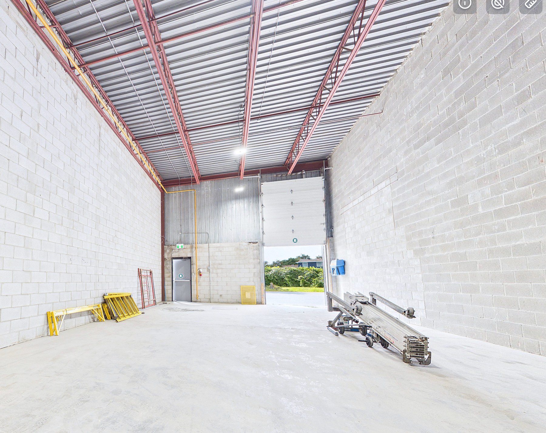Open warehouse interior showing clear height and the loading door at 2670 Lancaster Road